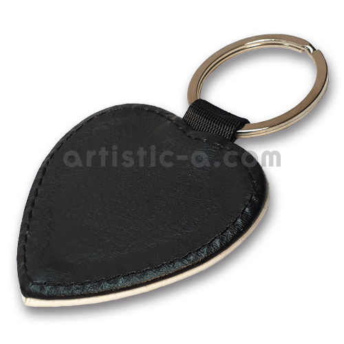 Textura de cuero sintético y costuras del llavero